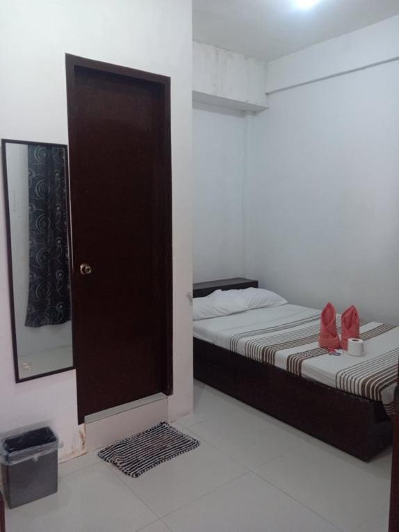 Chelle'S Apartelle-Inn El Nido Exterior photo